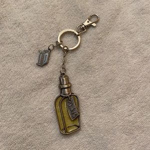 NWOT Alice in Wonderland keychain